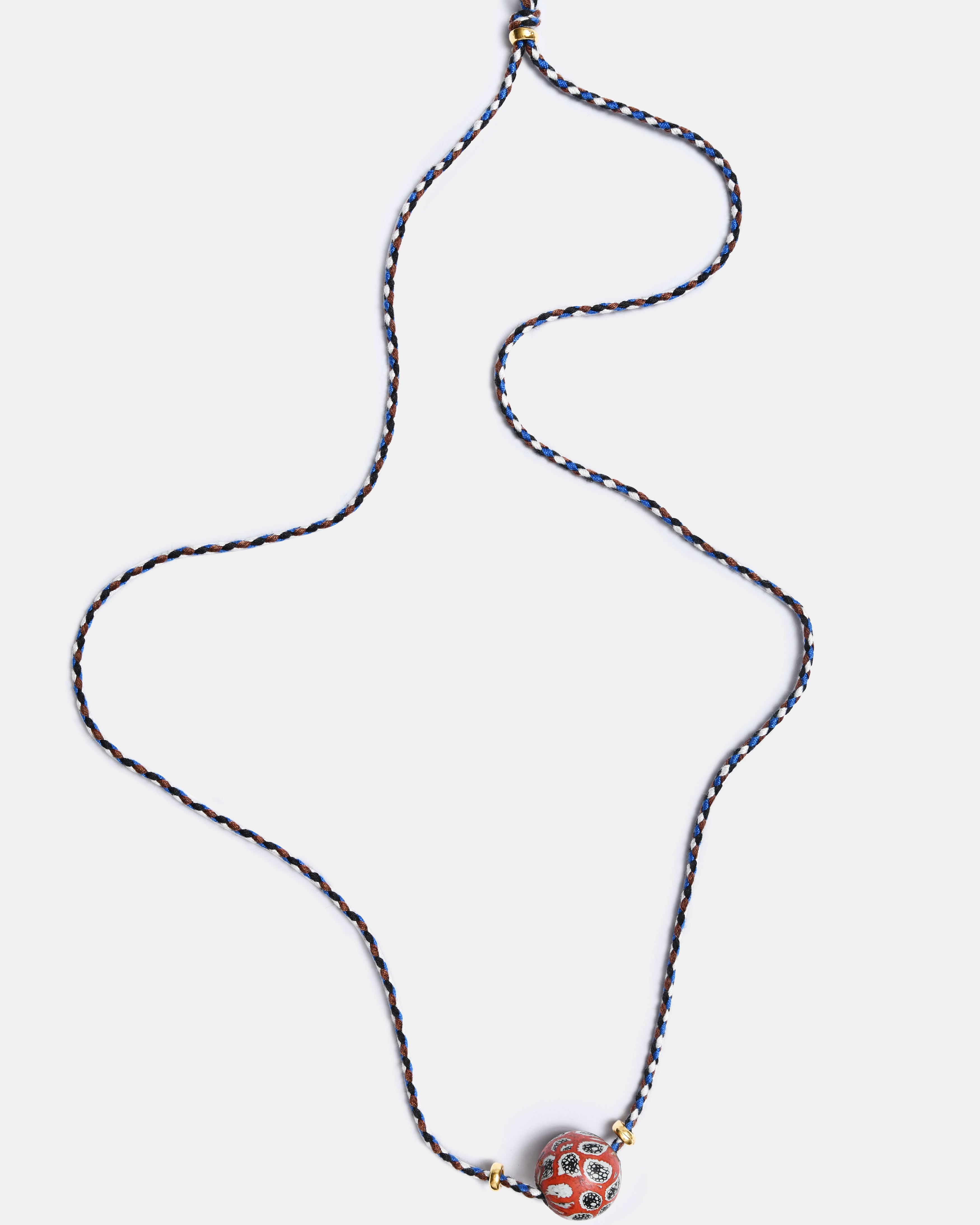 Indonesian glass boule on Peruvian cord